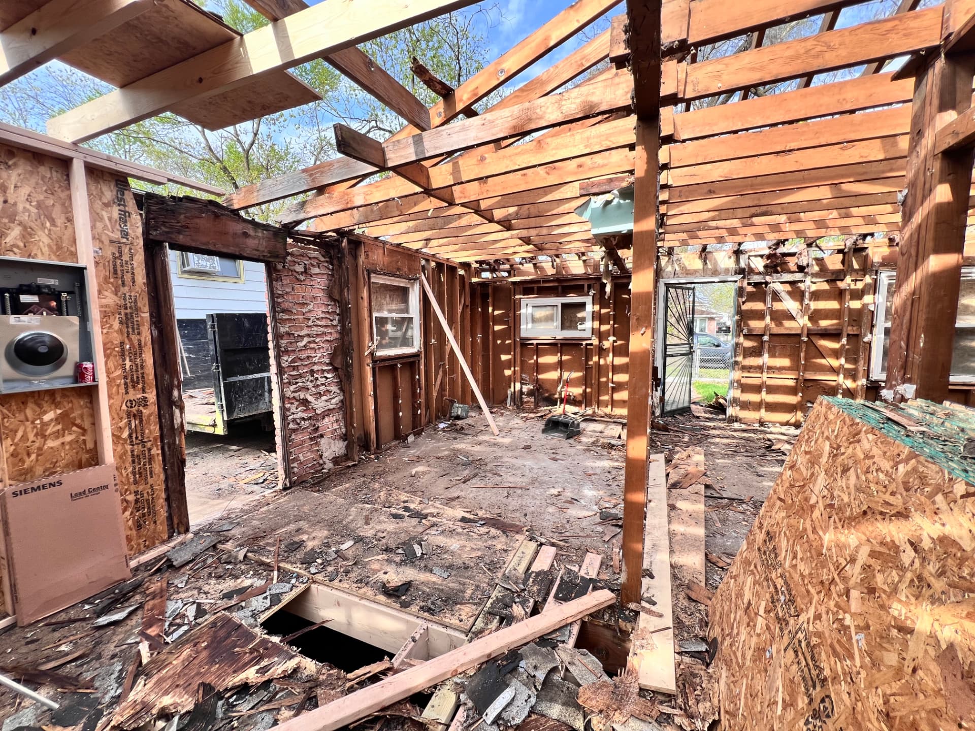 Winchester before photo: Interior opened to the framing