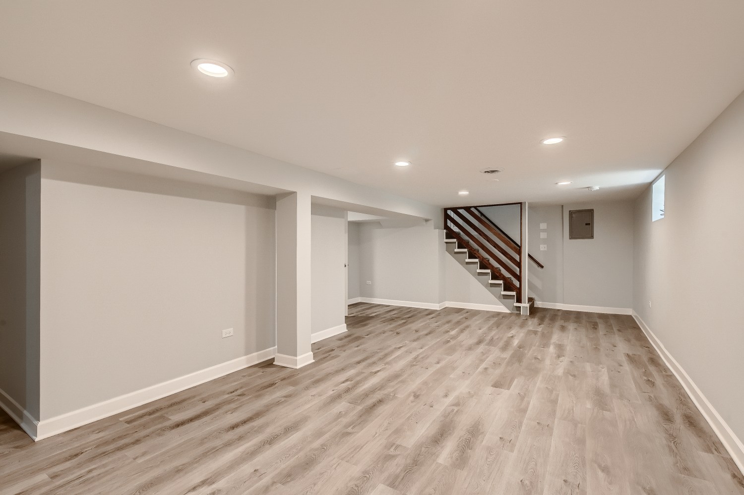 Sawyer after photo: Family room with basement stairs