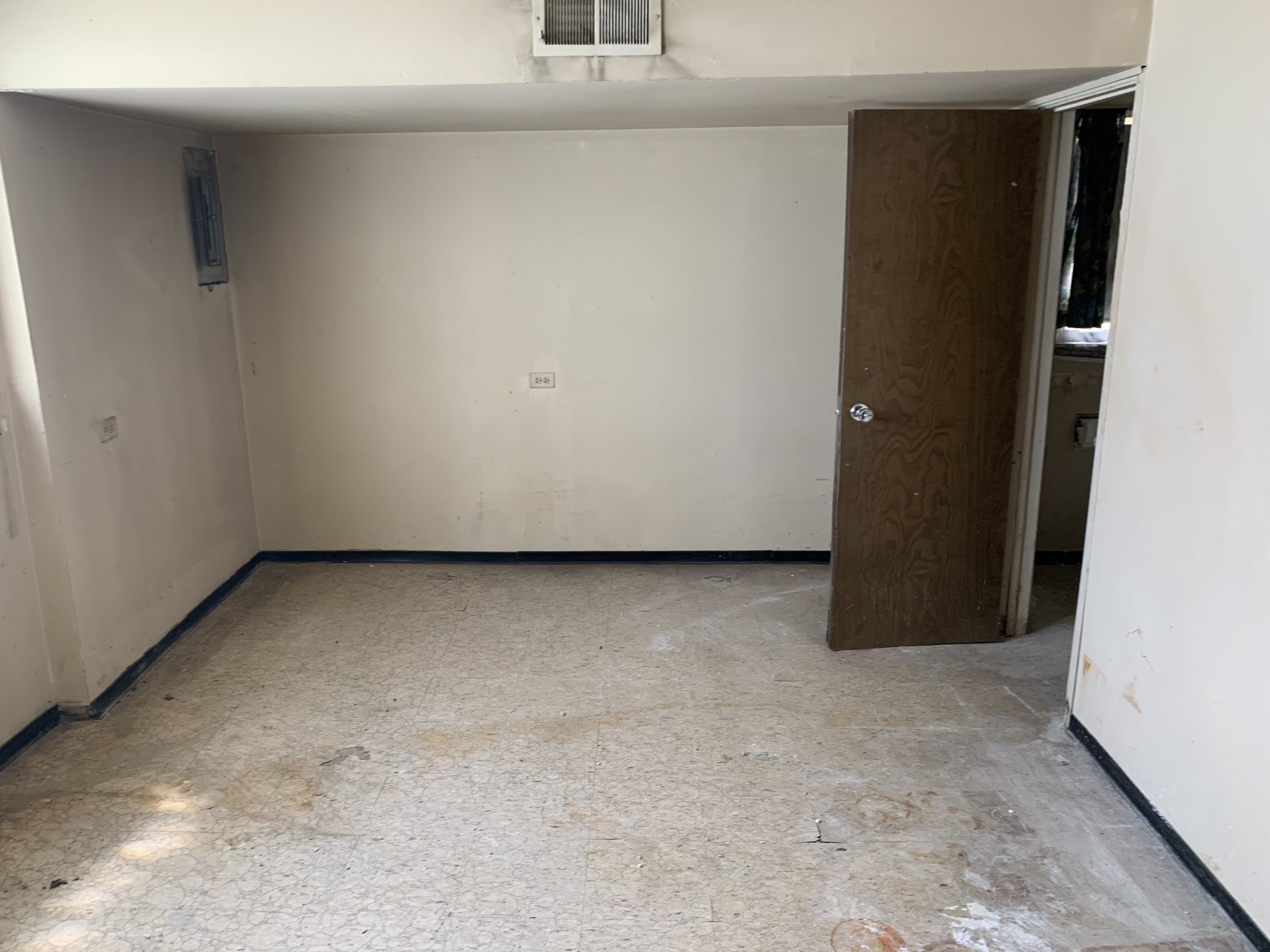 Racine before photo: Lower-level room