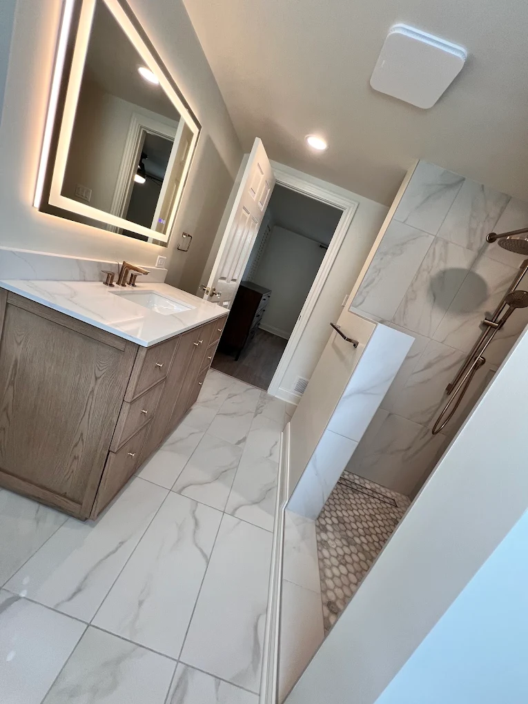 Fluted Oak & Sage Green after photo: Fluted oak vanity and doorless walk-in shower