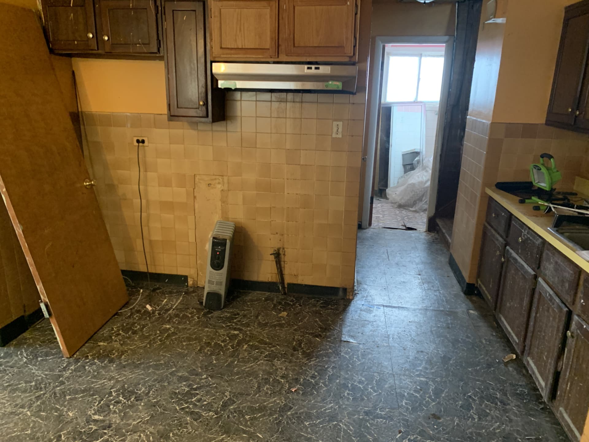 Dark Shaker Kitchen & Granite Counters before photo: Range wall before the remodel — original tile and cabinetry