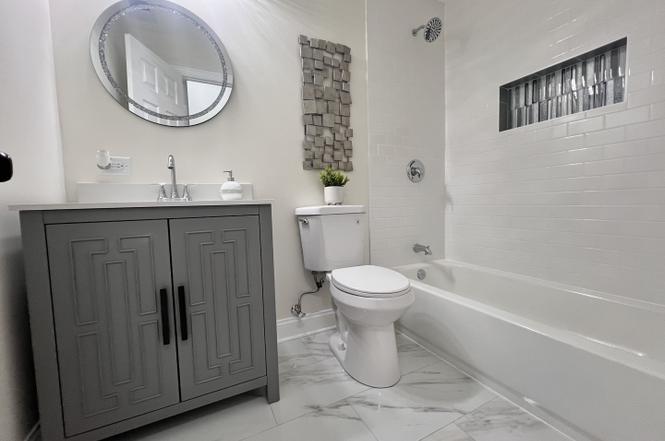 Winchester after photo: Full bath with vanity & tub