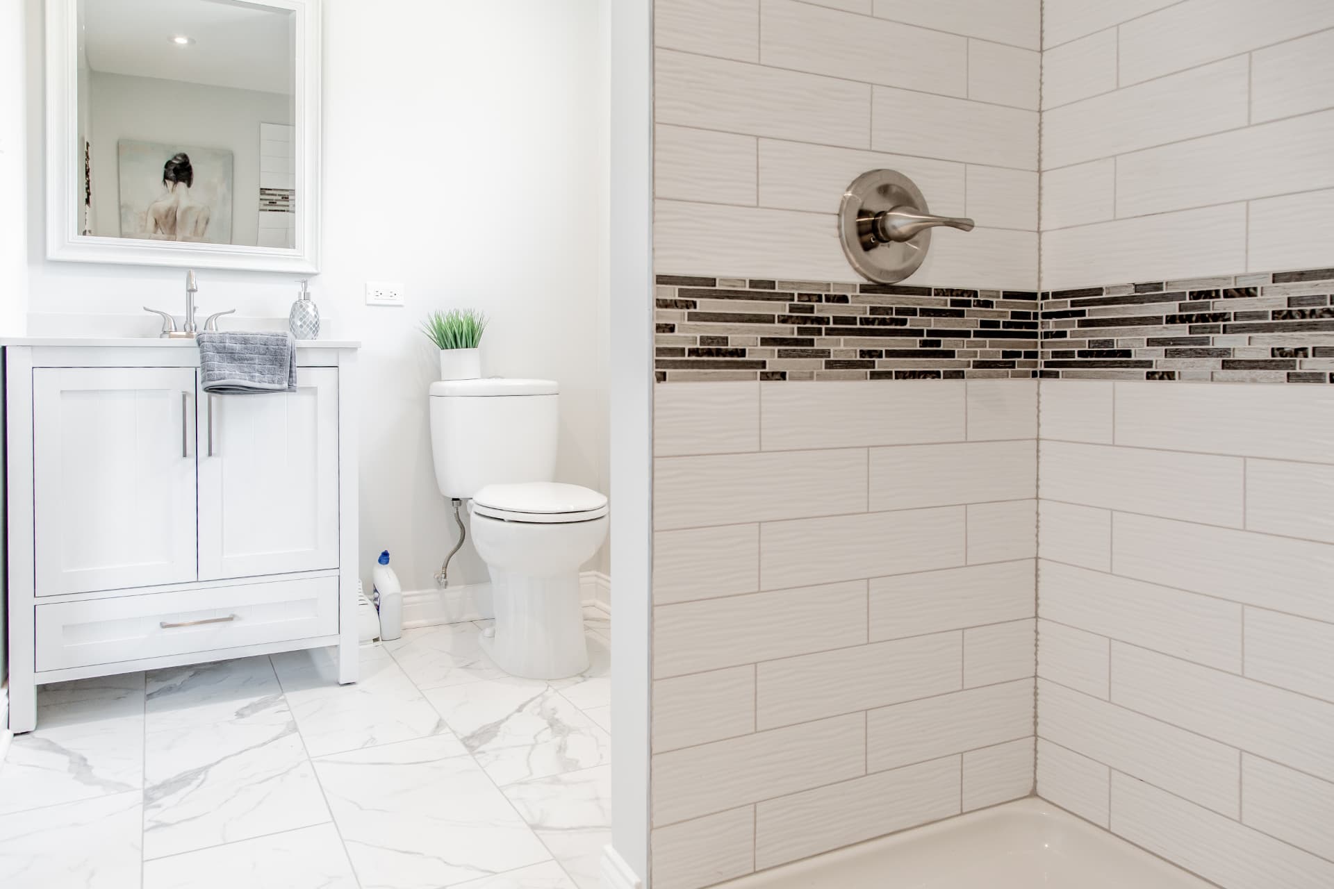 Wood after photo: Master suite bathroom and tiled shower