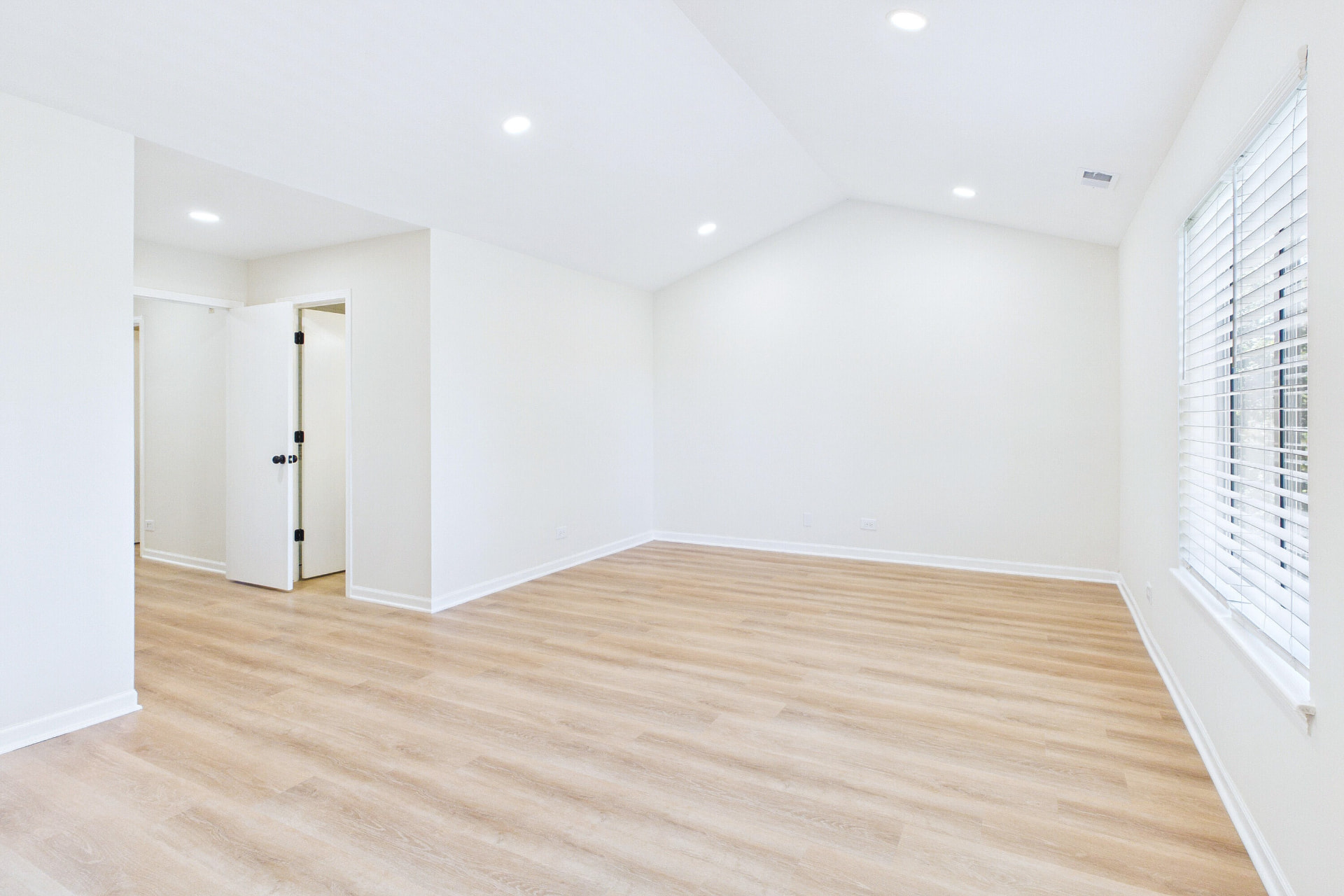 Charlotte after photo: Upstairs room & vaulted ceiling