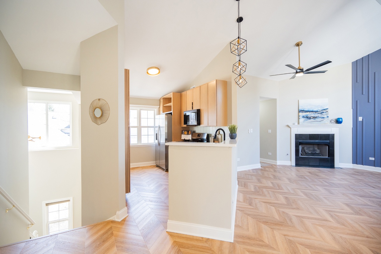 Rutland after photo: Kitchen, living & fireplace