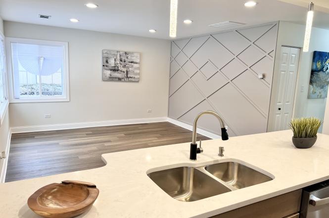Winchester after photo: Kitchen island & living area