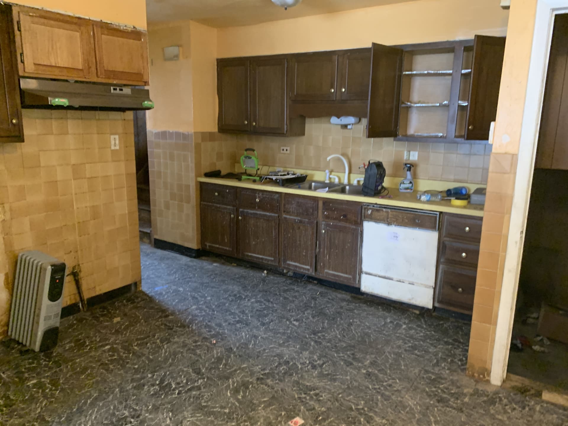 Dark Shaker Kitchen & Granite Counters before photo: Full view of the original kitchen before the remodel