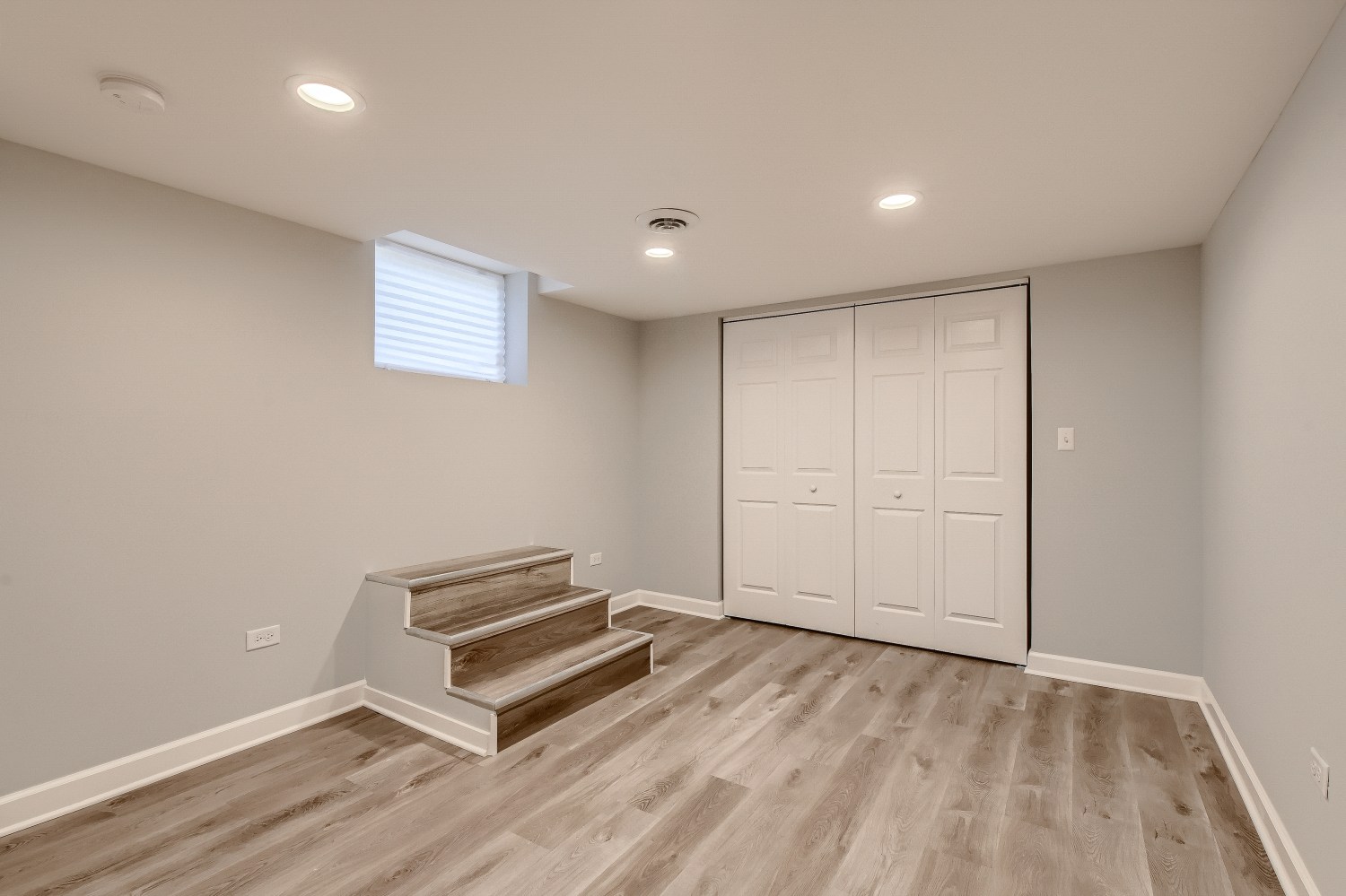 Sawyer after photo: Lower-level bedroom with double closet